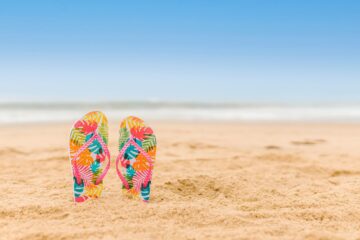 summer flip flops at the beach
